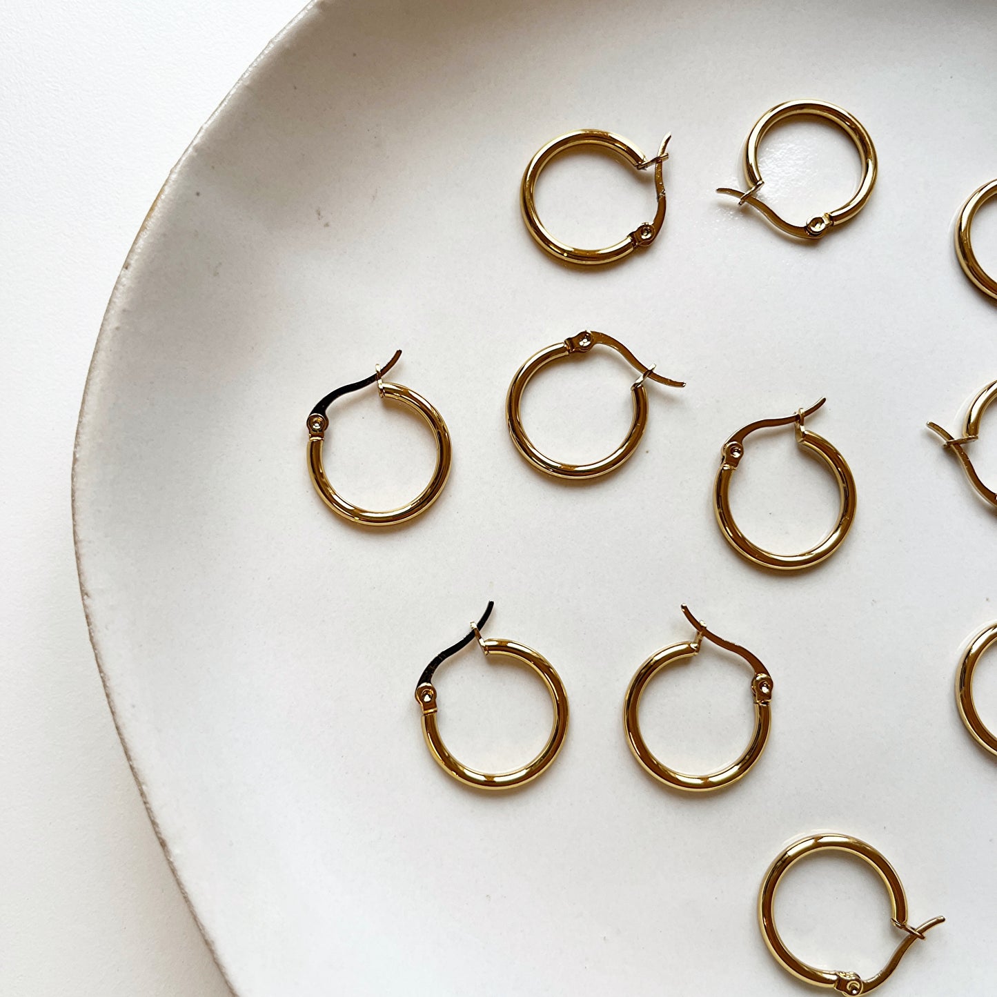 Huggie rond met clip-sluiting goud