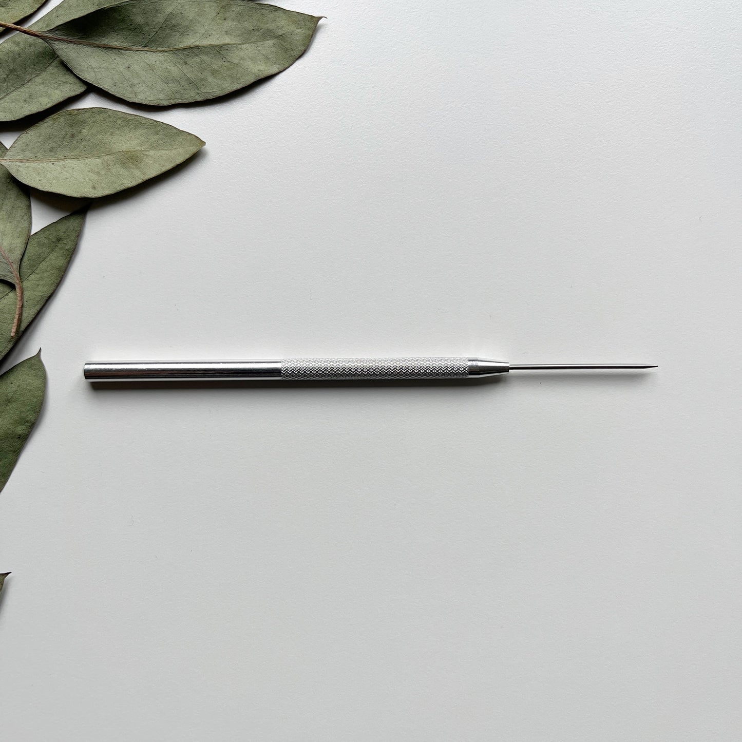 Needle tool