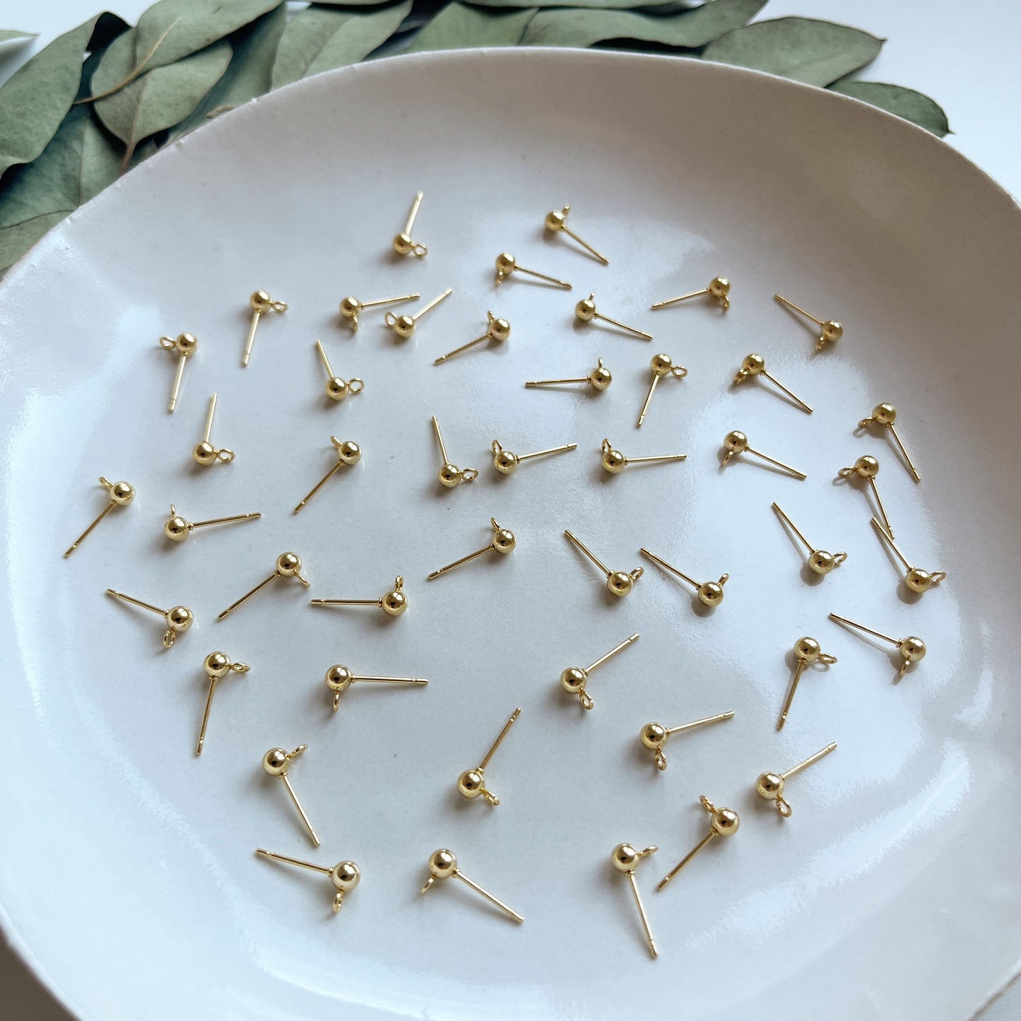 Oorsteker met bolletje goud