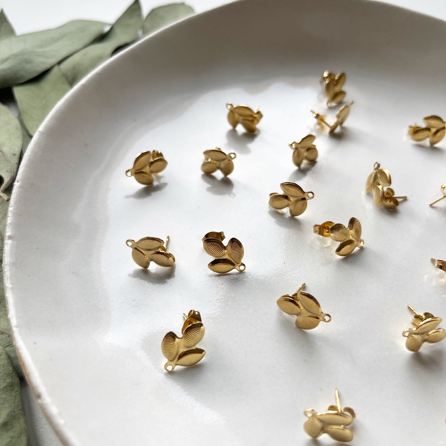 Oorsteker blad goud