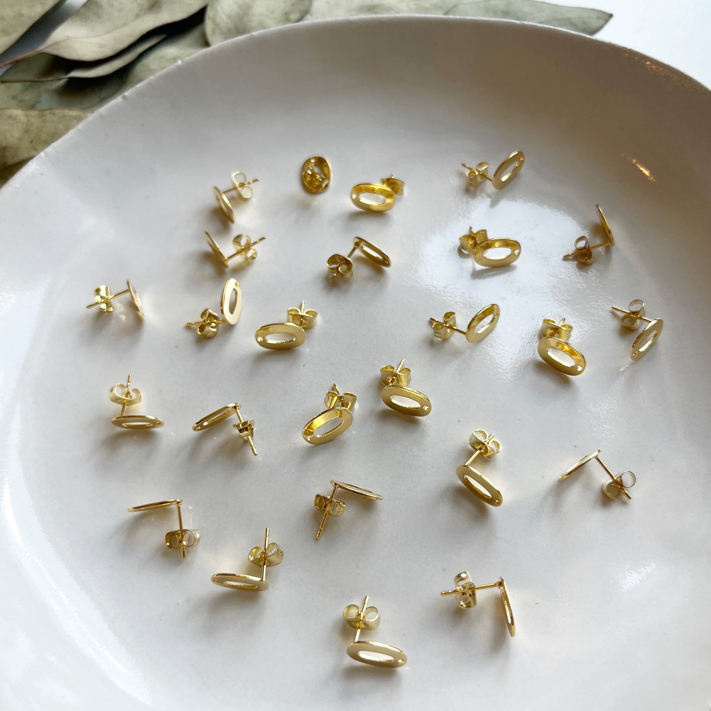 Oorsteker holle ovaal goud