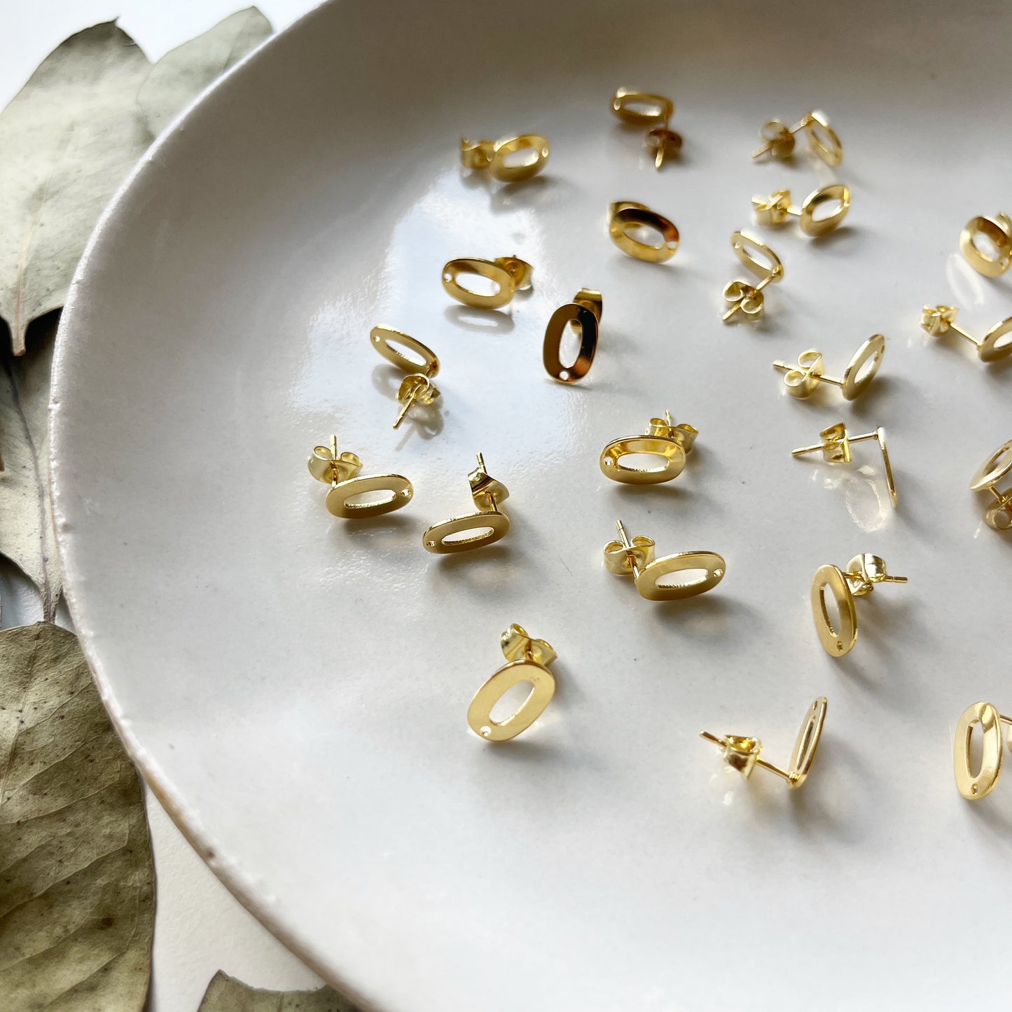 Oorsteker holle ovaal goud