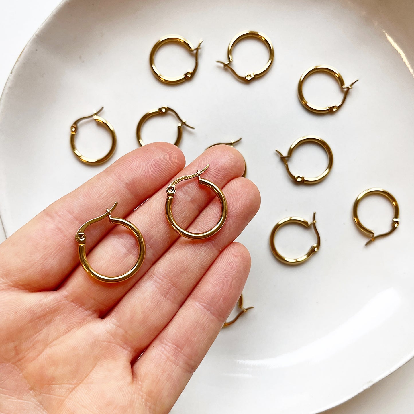 Huggie rond met clip-sluiting goud