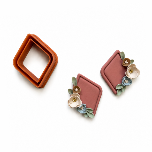 polymeerklei oorbellen met bloemen gemaakt met de ruit cutter
