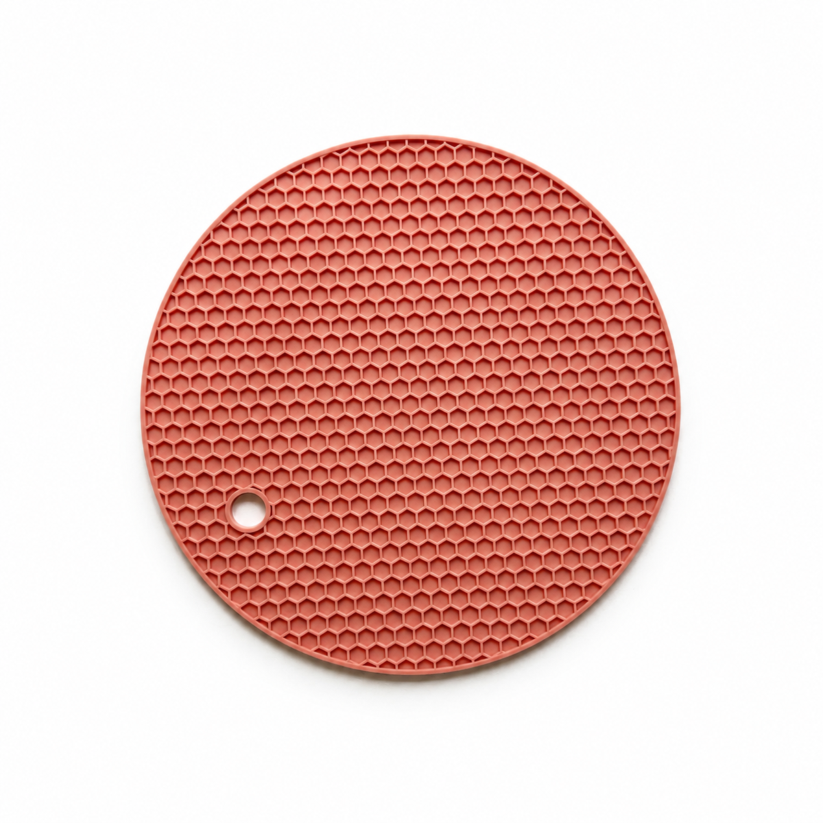 Roze siliconen matje voor het aanbrengen en uitharden van resin op polymeerklei oorbellen